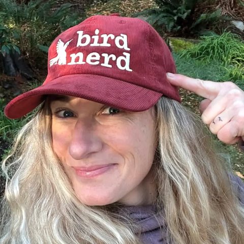 Jaymi Heimbuch in a bird nerd cap